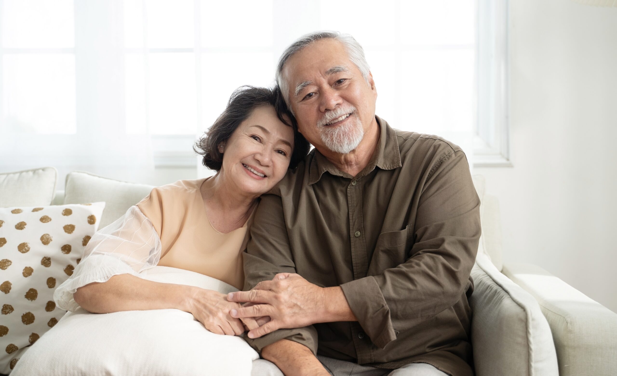 old asian couple smiling happily